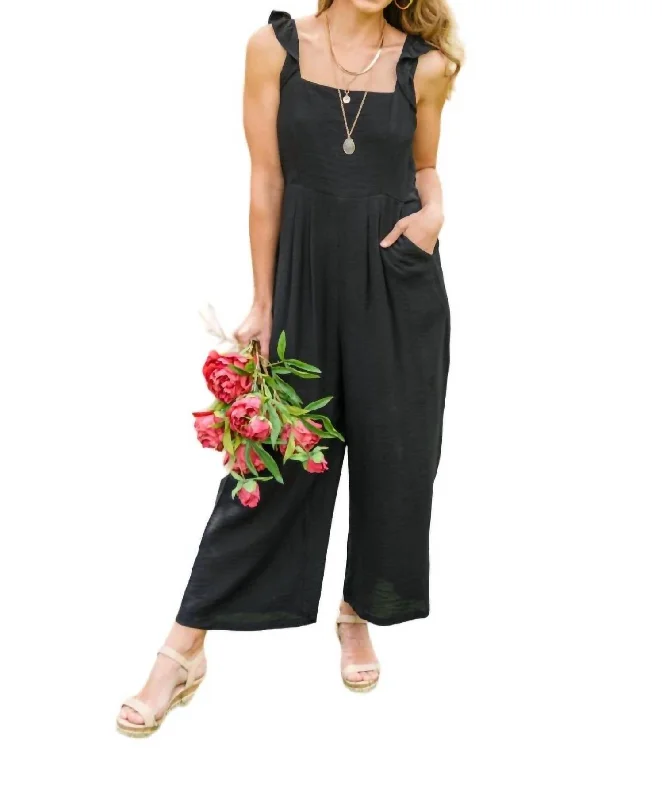 Redefining Women's Fashion Dropping In Jumpsuit In Black