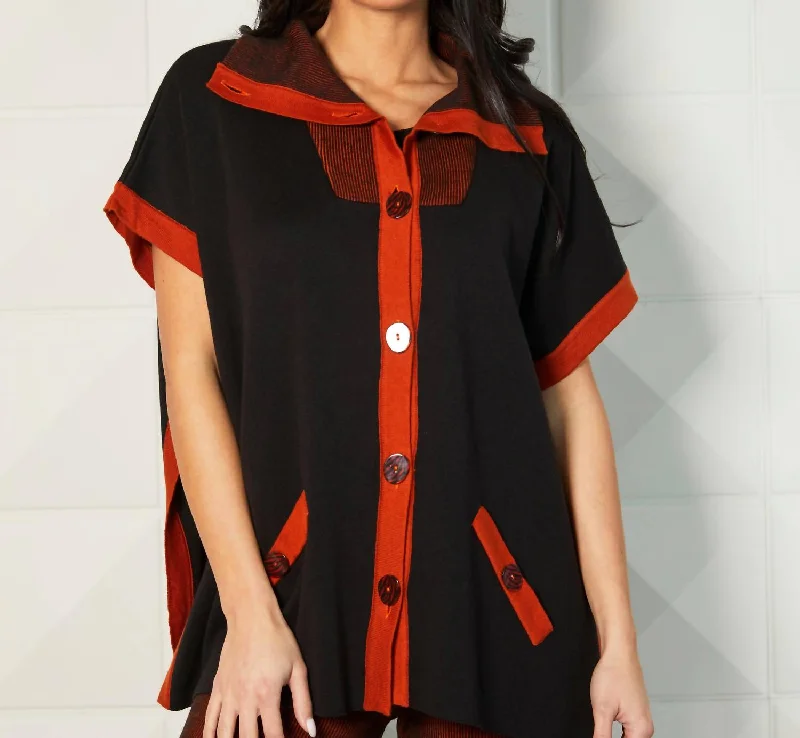 Chic And Edgy Button Up Poncho In Rust