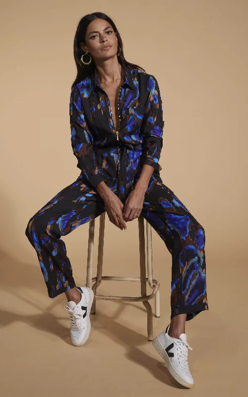 Unleash Your Trendy Side Roxanna Zip Jumpsuit In Camo Abstract Blue On Black